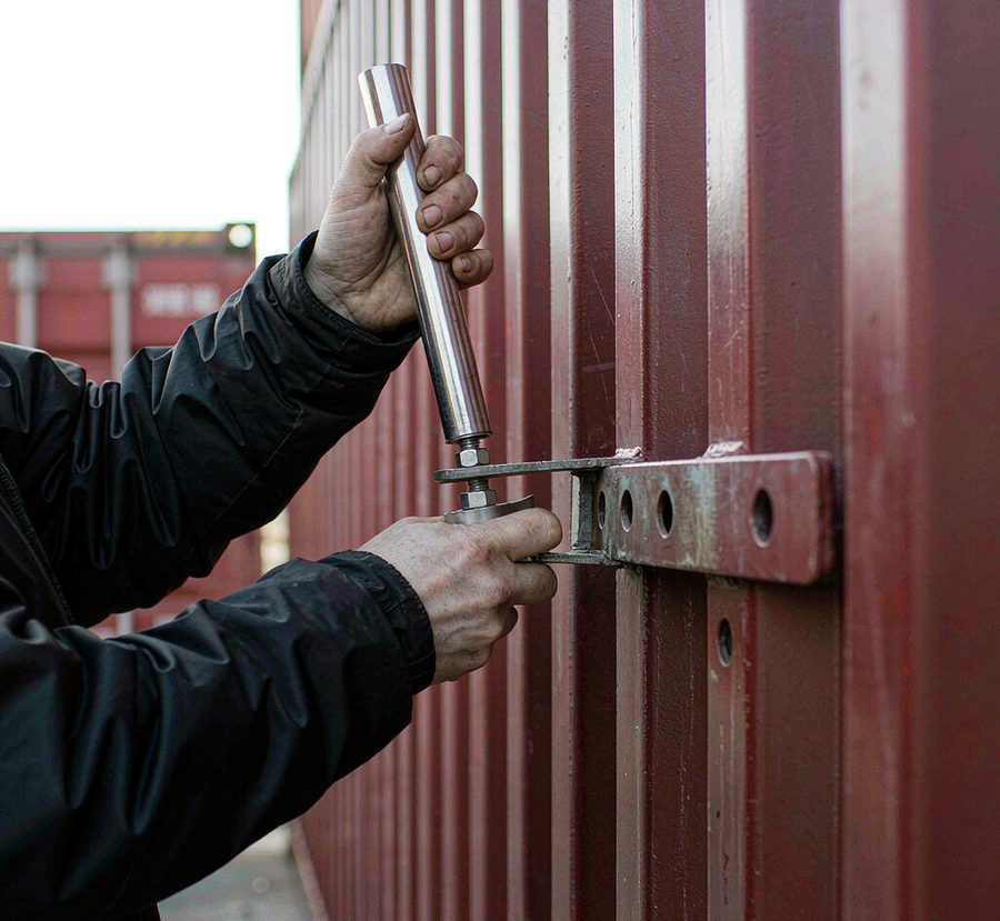 Numbered security seal applied on container doors